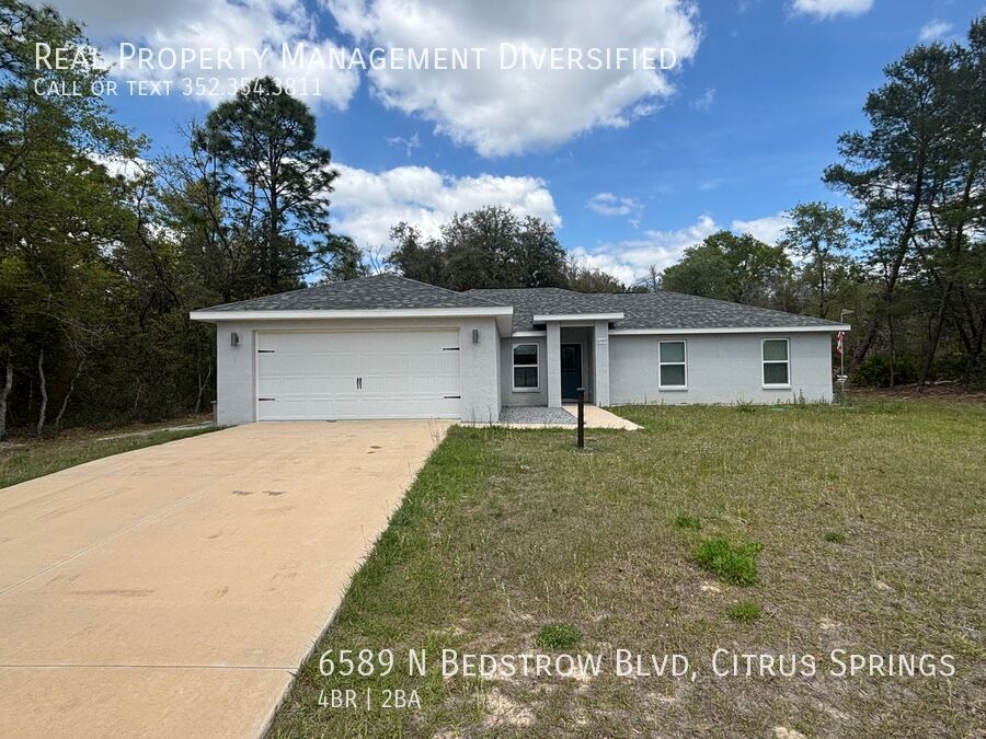 6589 N Bedstrow Blvd in Citrus Springs, FL - Building Photo