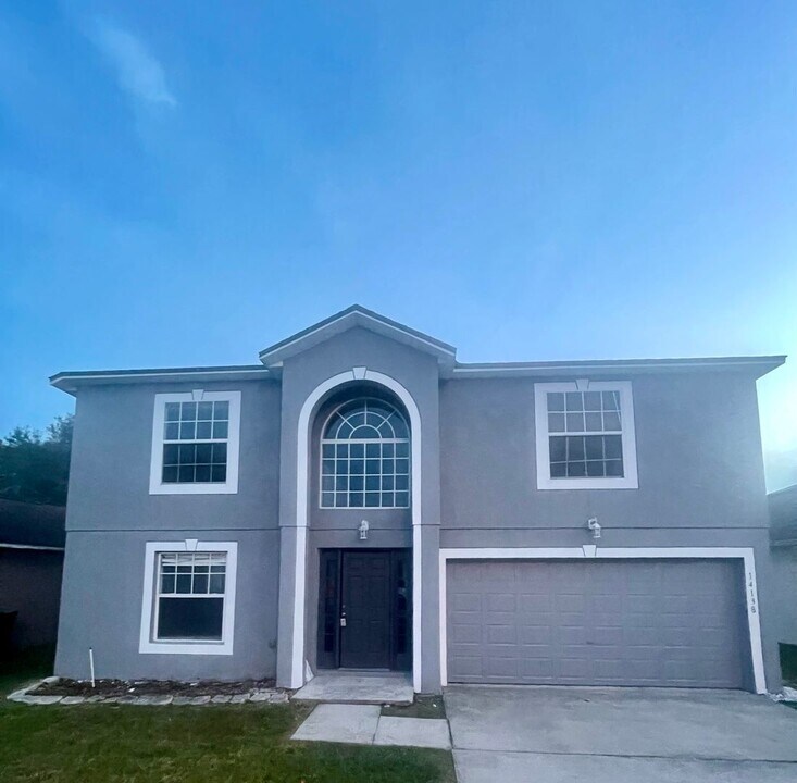 14138 Econ Woods Ln in Orlando, FL - Building Photo