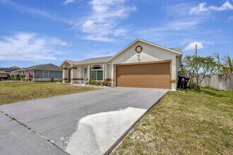 5489 NW Evanston Ave in Port St. Lucie, FL - Building Photo - Building Photo