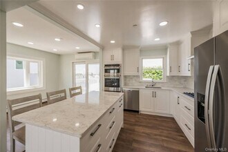 869 Beach St in Lindenhurst, NY - Building Photo - Building Photo