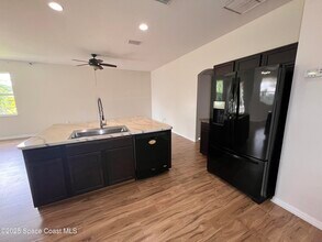 1458 Deming Dr SE in Palm Bay, FL - Building Photo - Building Photo