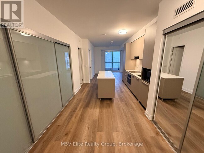 property at 65 Broadway Ave