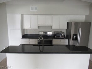 7965 Preserve Cir in Naples, FL - Foto de edificio - Building Photo