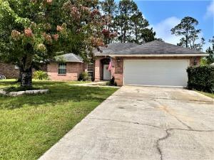 1596 Champagne Ave in Gulf Breeze, FL - Building Photo