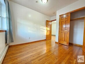 Spacious 3-Bedroom Apartment in Woodside in Queens, NY - Building Photo - Building Photo