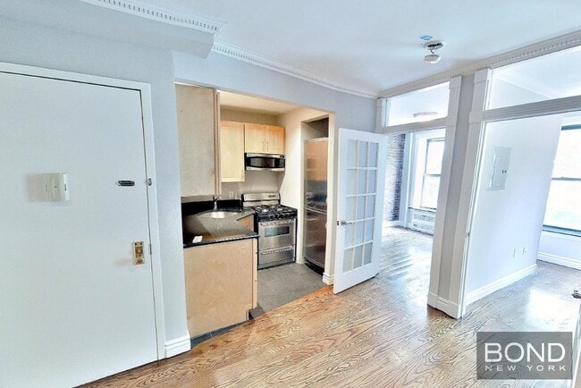 property at 420 E 9th St