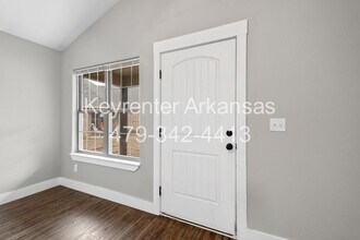 445 Oakwoods Dr in Elkins, AR - Building Photo - Building Photo