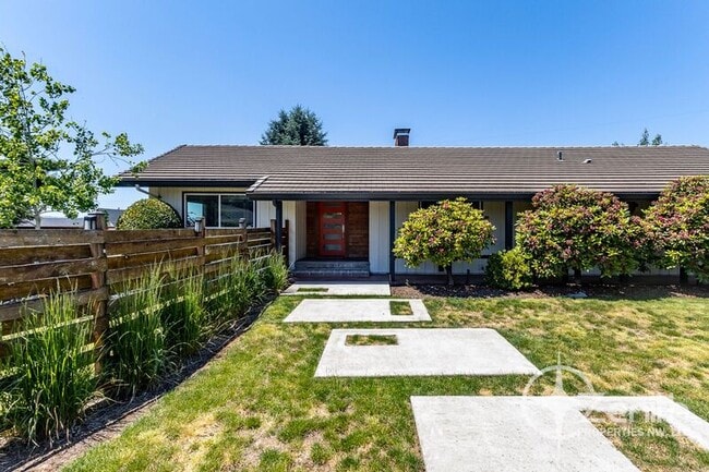 property at 8013 SE Maple Ave