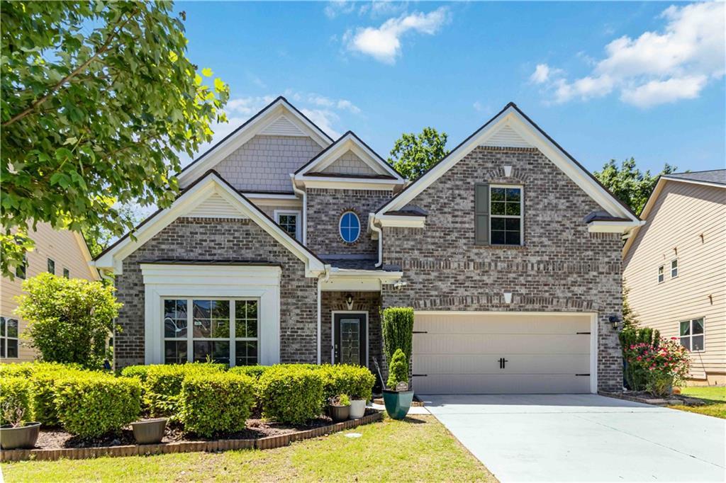 6940 Rocking Horse Ln in Cumming, GA - Building Photo