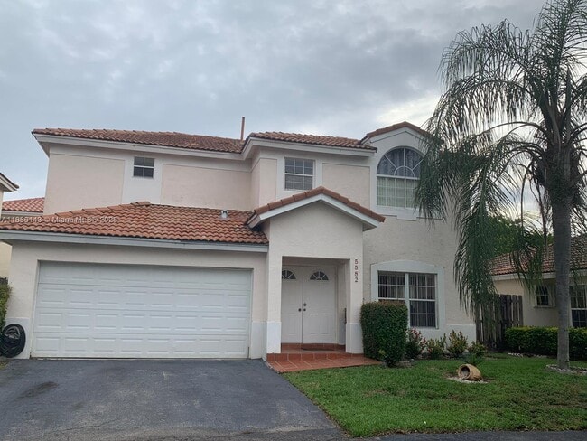 property at 5582 NW 102nd Pl