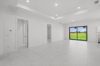 3927 NW 40th Terrace in Cape Coral, FL - Building Photo - Building Photo