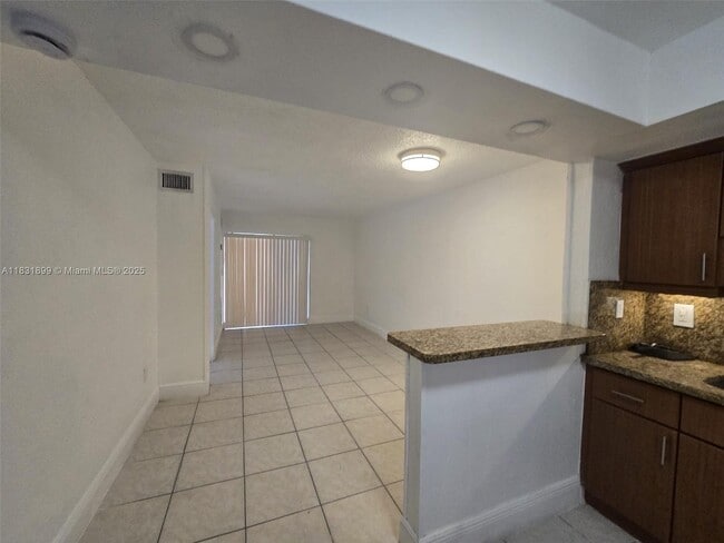 property at 2441 NW 13th St