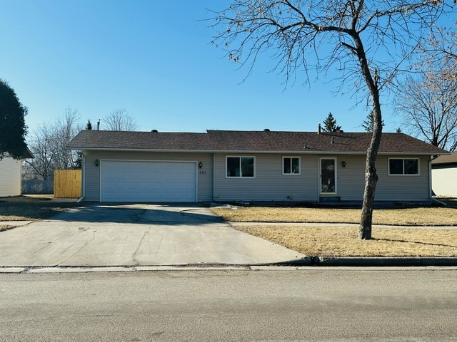 property at 301 10 1/2 Ave E