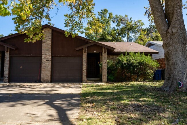 property at 6135 S Troost Ave