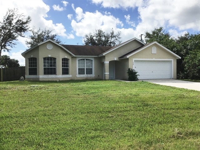 558 Hatcher St SE in Palm Bay, FL - Foto de edificio