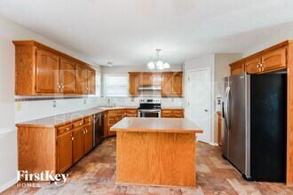 408 Preakness Dr in Raymore, MO - Building Photo - Building Photo