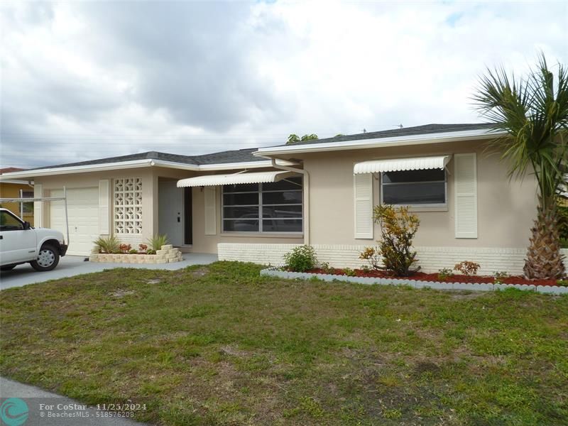 5103 NW 55th Ct in Tamarac, FL - Building Photo