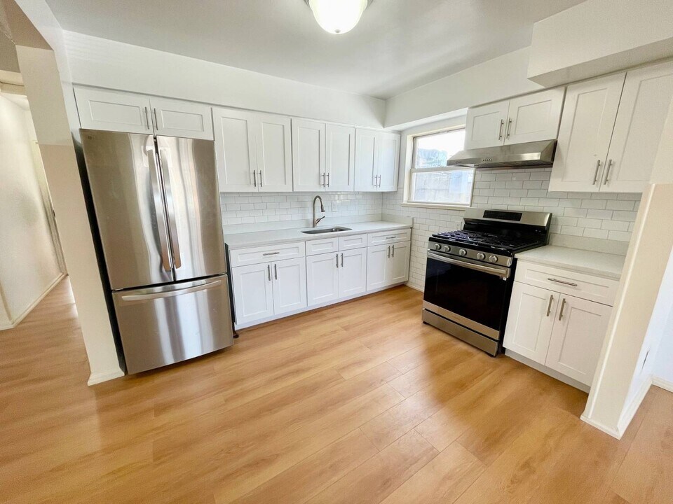 213-44-213-40 40th Ave in Queens, NY - Building Photo