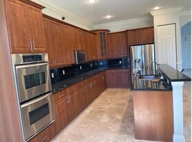 9326 Plantation Estates Dr in Royal Palm Beach, FL - Building Photo