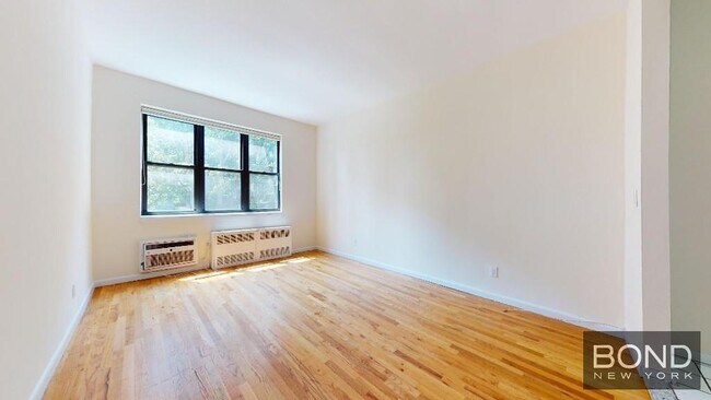 property at 225 E 10th St