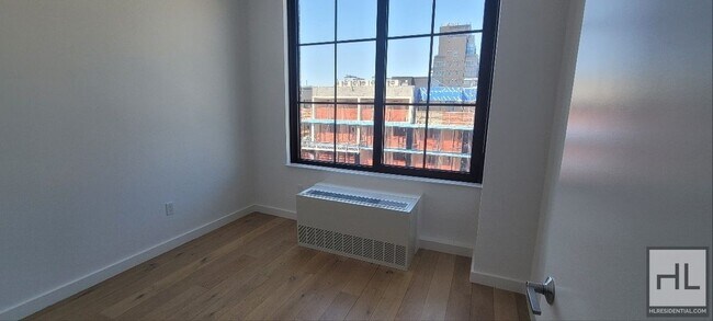 Modern 1-Bedroom Apartment with a Balcony! in Queens, NY - Building Photo - Building Photo
