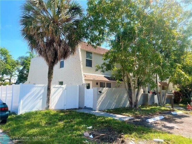 property at 7347 NW 75th St