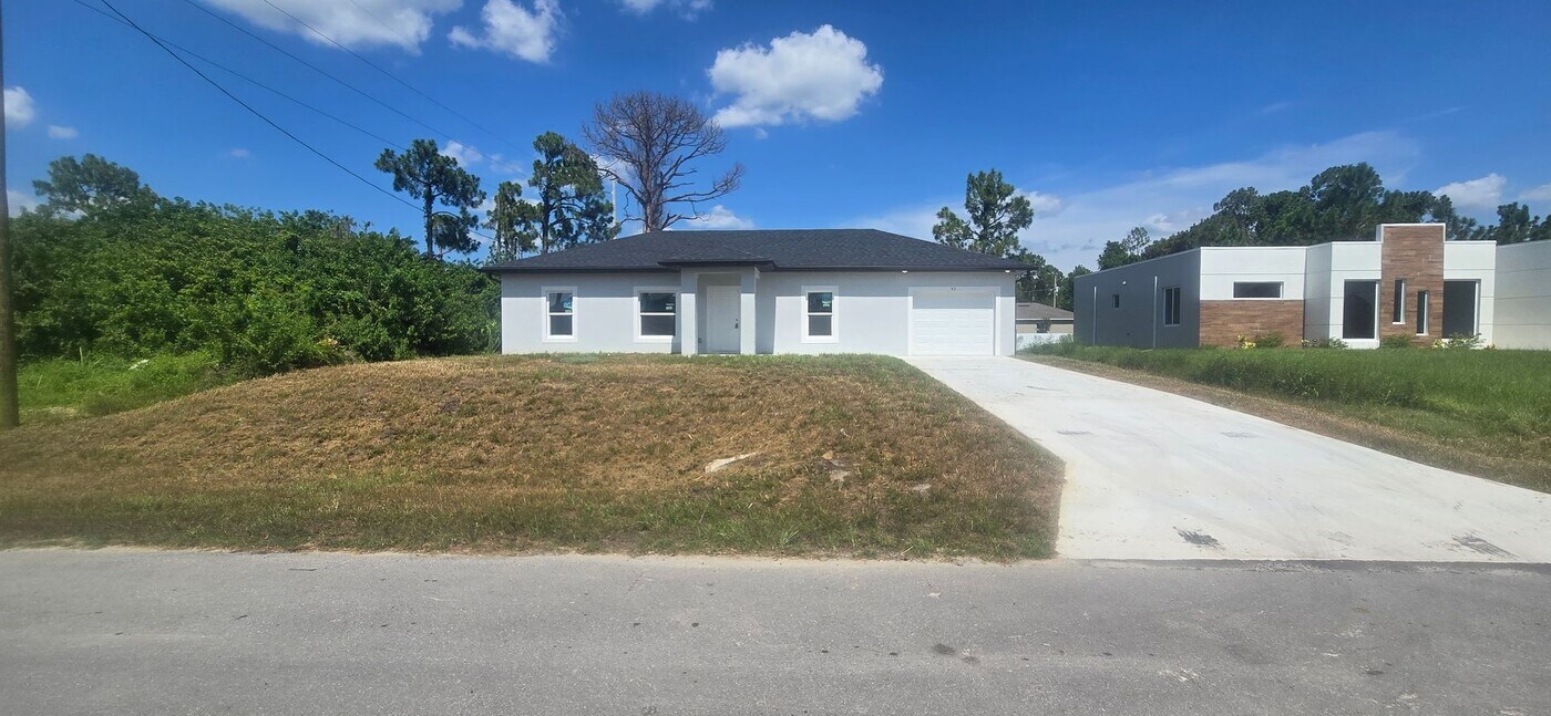 53 Colin Ave S in Lehigh Acres, FL - Building Photo