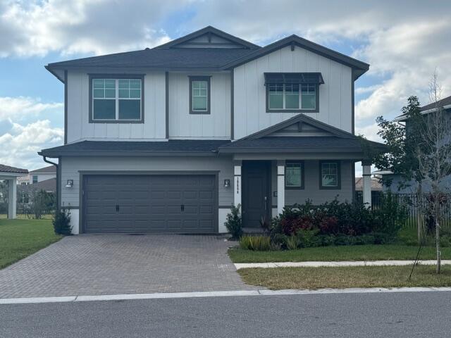 19668 Blooming Orch Dr in Loxahatchee, FL - Building Photo