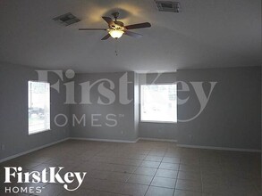 3562 SW Carmody St, Unit 1F in Port St. Lucie, FL - Foto de edificio - Building Photo