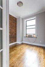 75 Kenmare St in New York, NY - Building Photo - Building Photo