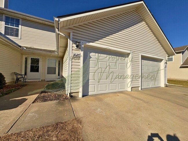 property at 102 NE Sunshine St