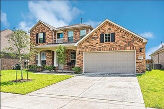 24526 Raven Cliff Falls Dr in Tomball, TX - Foto de edificio - Building Photo