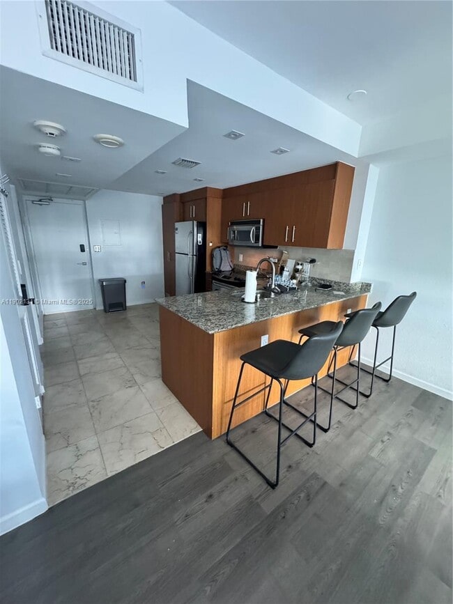 property at 10275 Collins Ave