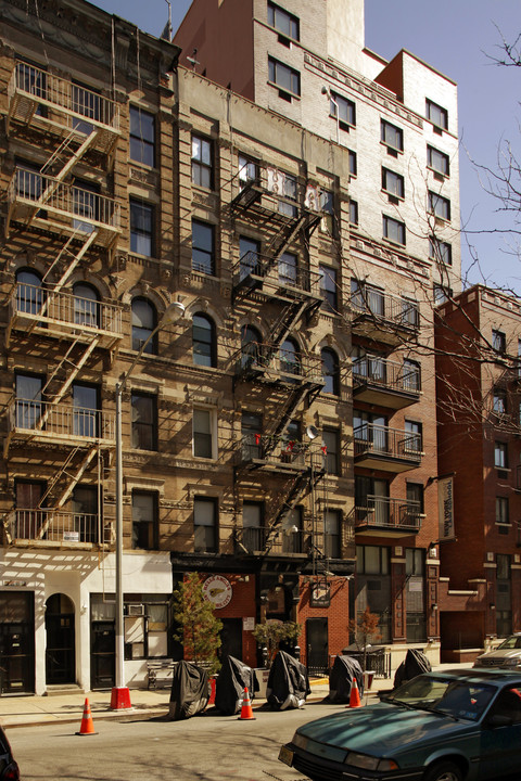 77 E 3rd St in New York, NY - Building Photo