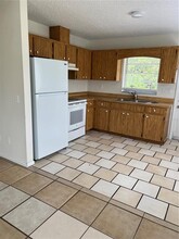 12056 Henley Ave in Port Charlotte, FL - Building Photo - Building Photo