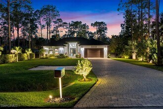 5858 Star Grass Ln in Naples, FL - Building Photo - Building Photo