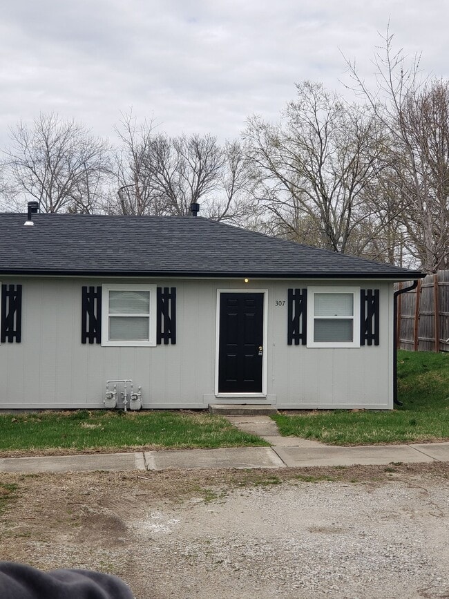 property at 305 E 3rd St