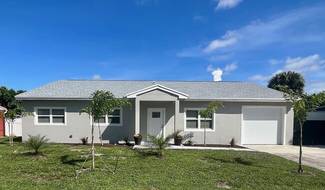 9122 Bamboo Dr in Palm Beach Gardens, FL - Building Photo - Building Photo