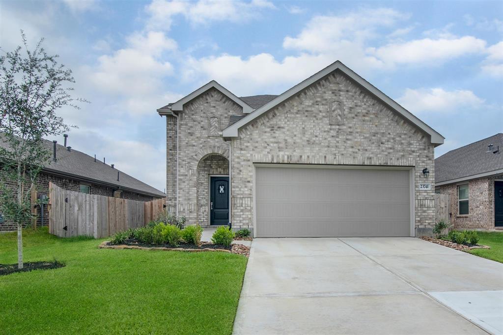 23741 Woodgreen Terrace Dr in New Caney, TX - Foto de edificio