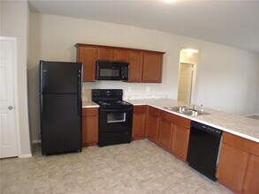 704 NW 70th Ave in Bentonville, AR - Building Photo - Building Photo