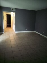 2100 W Beach Dr, Unit F102 in Panama City, FL - Building Photo - Building Photo