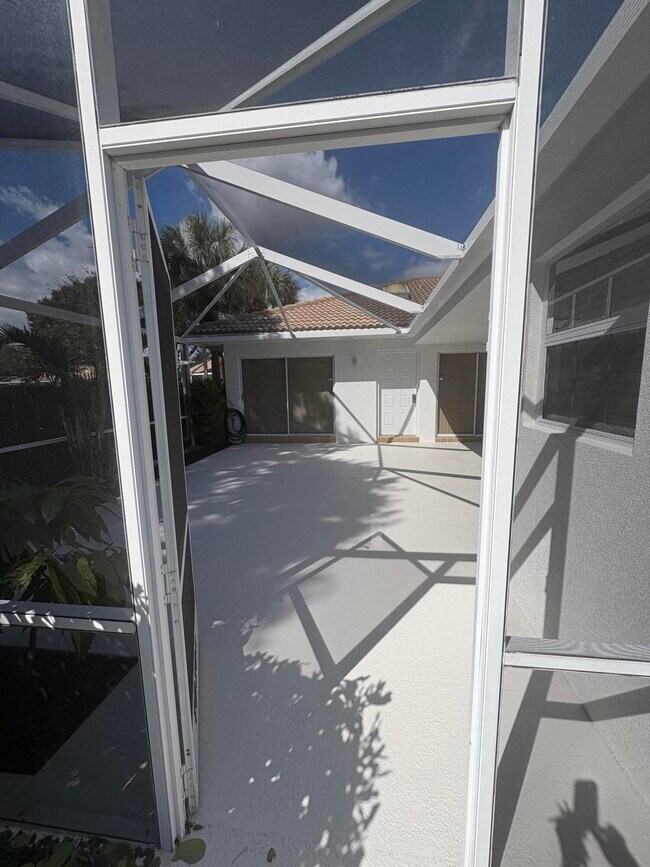 10303 Chapman Oak Ct in Palm Beach Gardens, FL - Building Photo - Building Photo