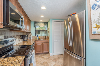 2390 Ocean Shore Blvd, Unit 104 in Ormond Beach, FL - Foto de edificio - Building Photo
