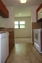 4088 N Pine Island Rd in Sunrise, FL - Building Photo - Building Photo