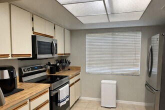 441 N Harbor City Blvd, Unit A13 in Melbourne, FL - Foto de edificio - Building Photo