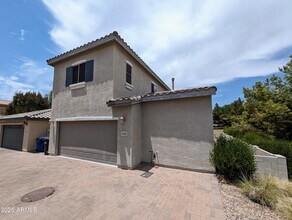 14182 W Country Gables Dr in Surprise, AZ - Building Photo - Building Photo