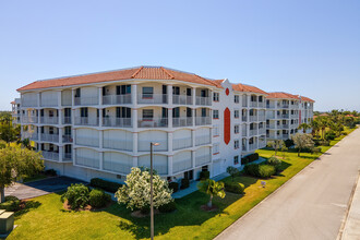 Puerto Del Rio Condominiums in Cape Canaveral, FL - Building Photo - Building Photo