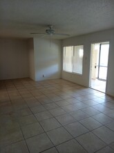 5801 Whispering Pine Way in Greenacres, FL - Building Photo - Building Photo