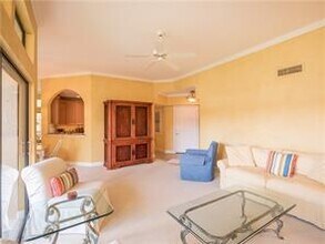 6525 Valen Way-Unit -D-202 in Naples, FL - Building Photo - Building Photo
