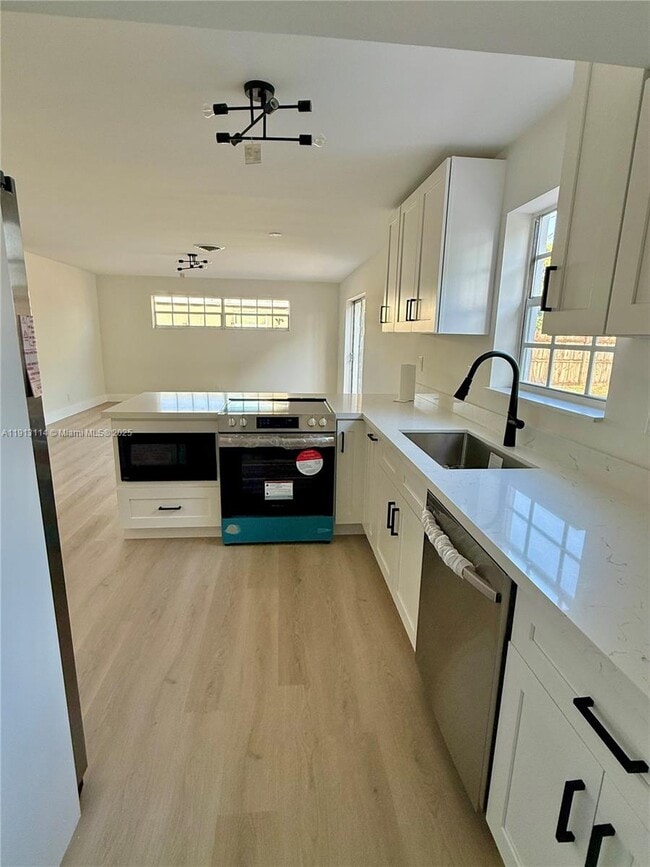 property at 6570 NW 6th Ct